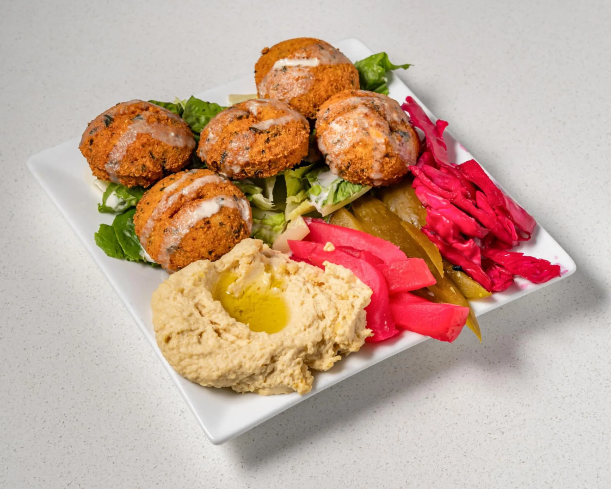 Manakish flatbreads baked fresh at Baladna Restaurant and Bakery in Calgary